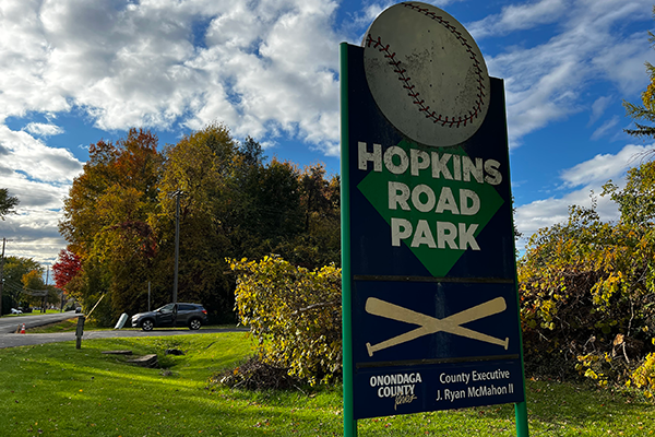 A sign welcomes visitors to the Hopkins Road Park