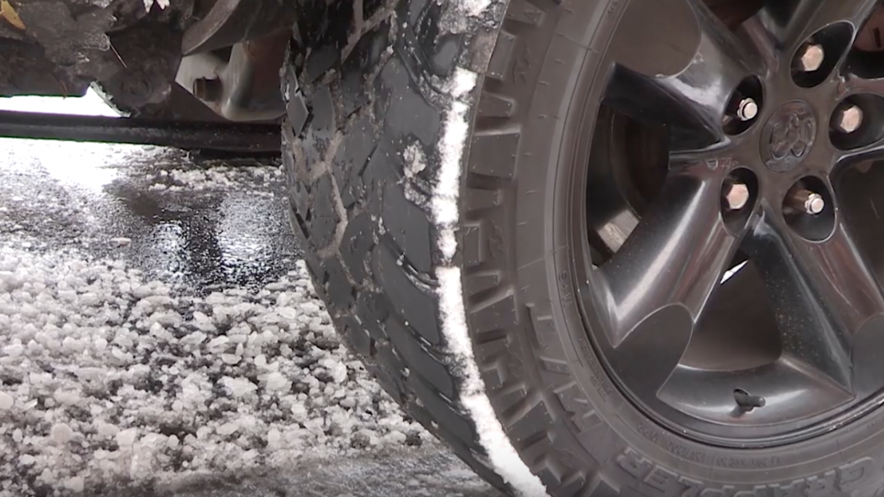 Snow filling the creases of a tire.