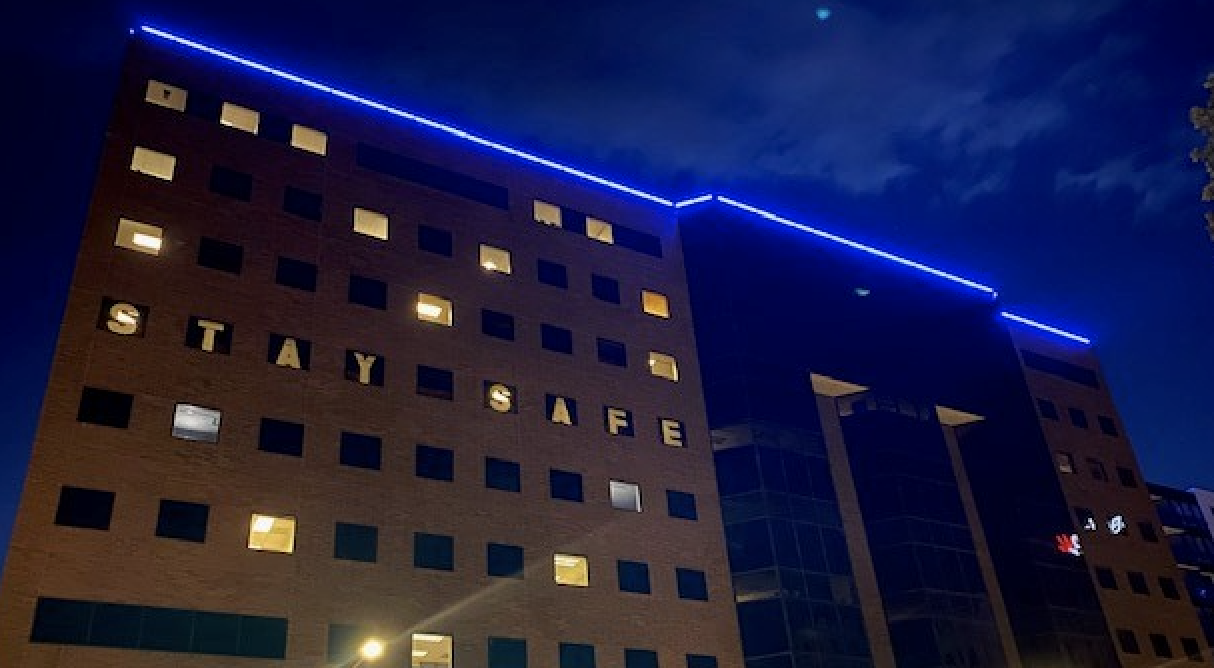 A building downtown lighting up blue to spread awareness for child abuse.