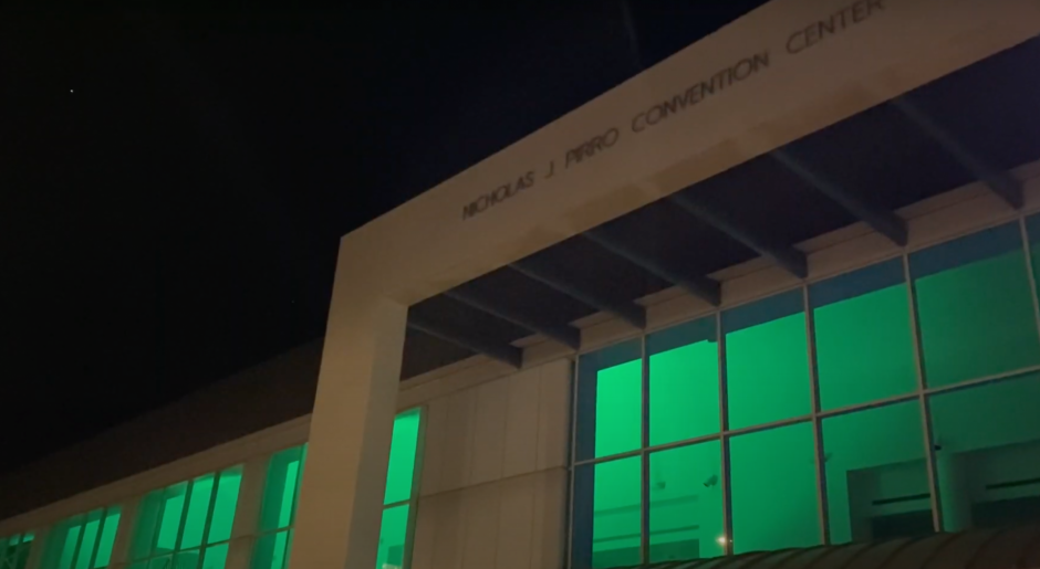 OnCenter in Syracuse illuminated with green light