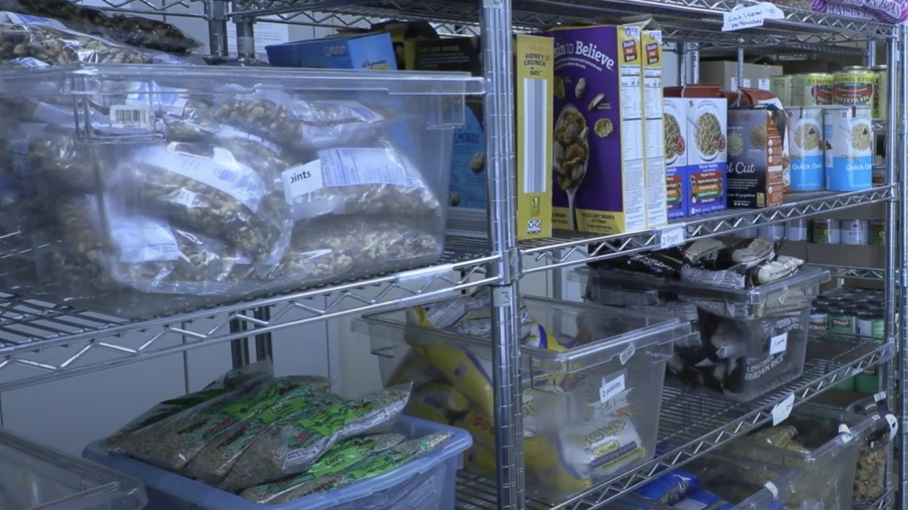 Food stored in shelves at a food pantry.