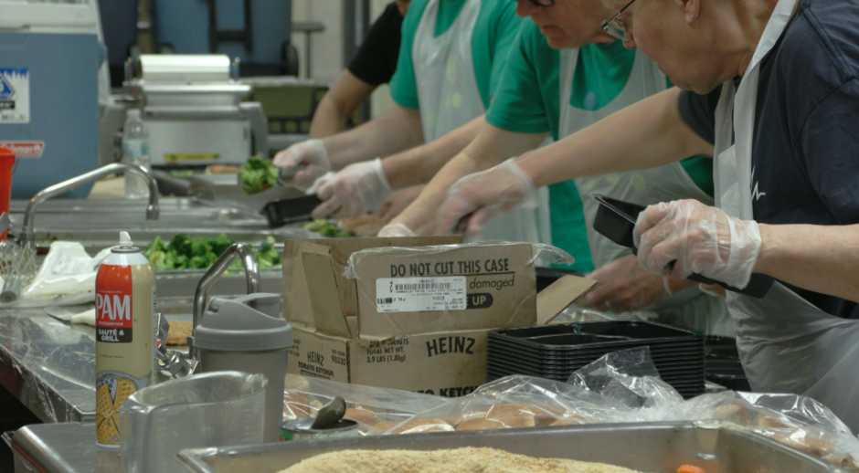 volunteers making food