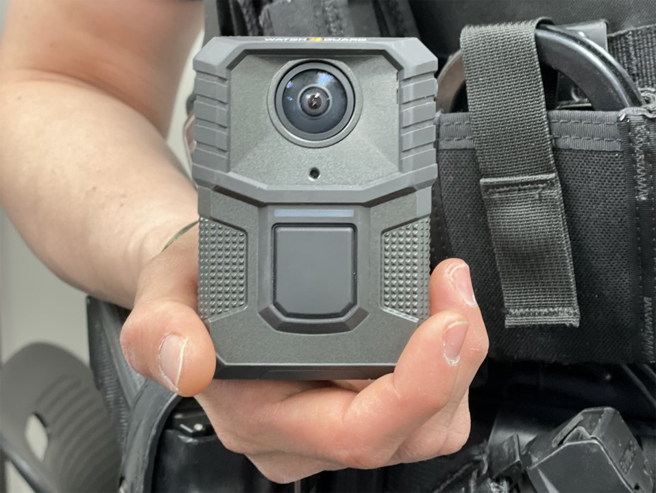 A body camera being held by an officer. Ten body cameras were given to the 18 police officers at the Cicero Police Department in early to help improve transparency between the police and the public.