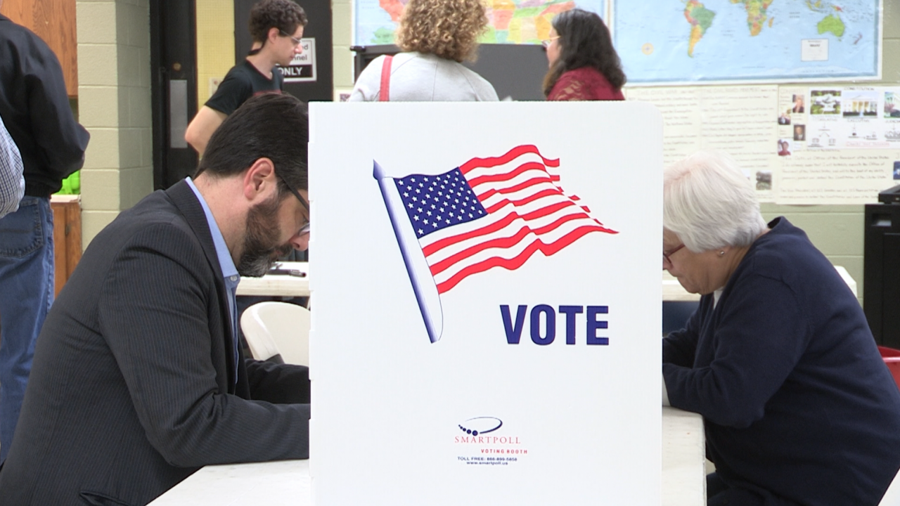 Two Onondaga County voters cast early ballots.