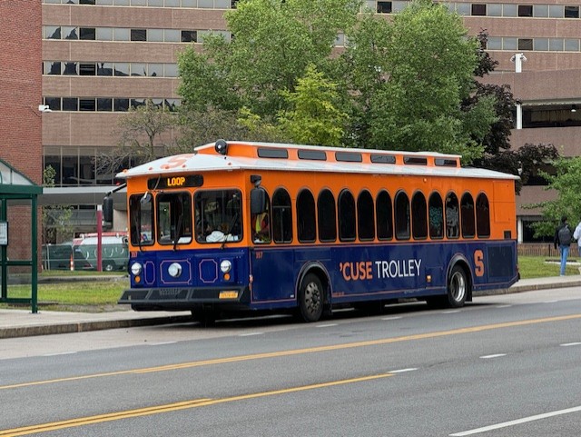 The Syracuse trolley moving through town