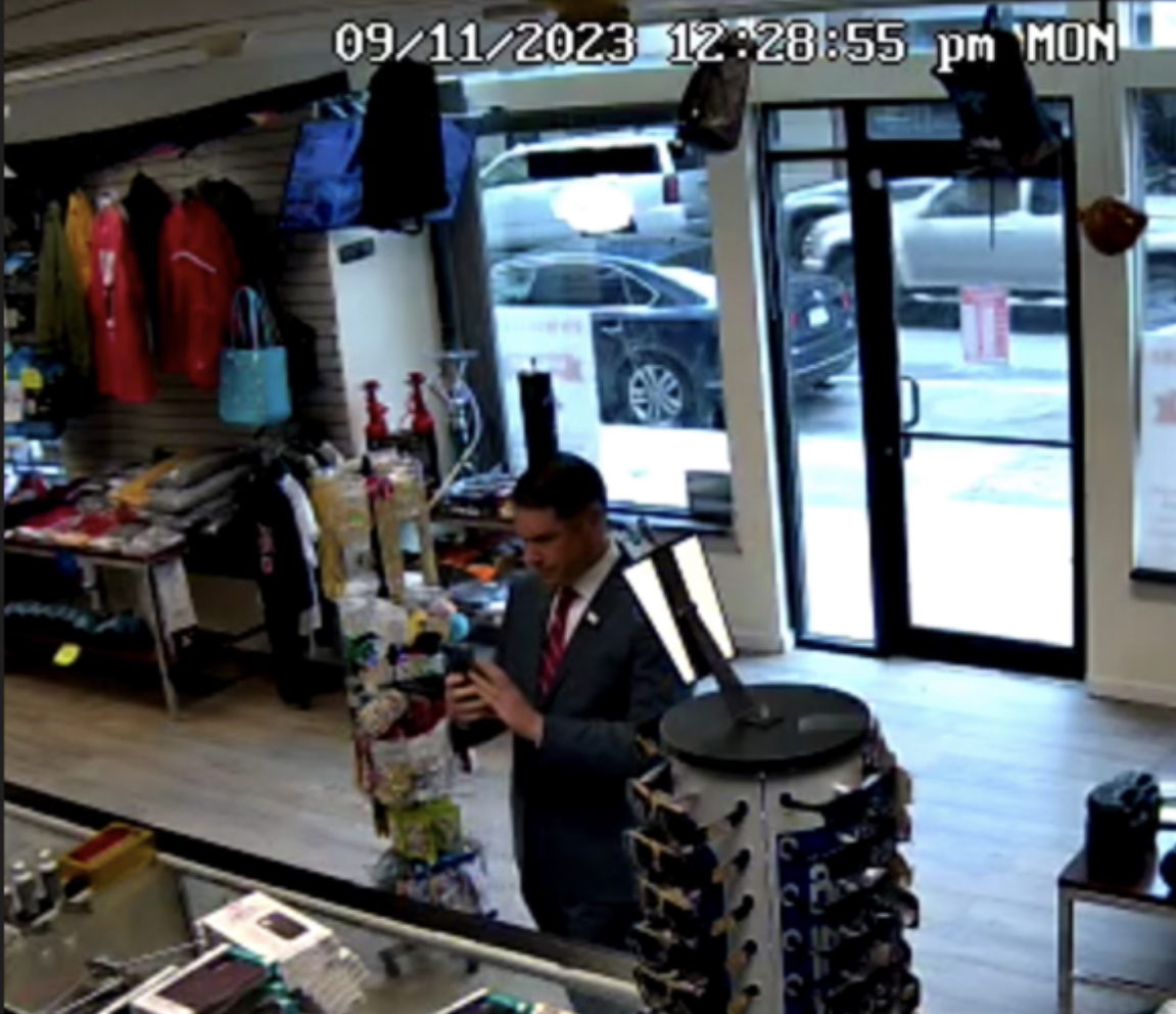 Security footage appears to show Mayor Ben Walsh on Sept. 11, 2023 taking photos inside T's Wireless.