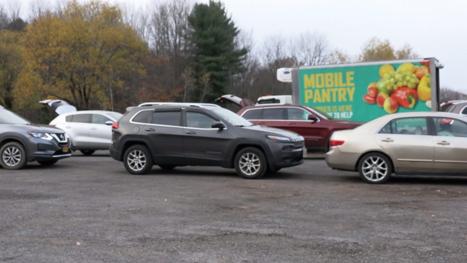 Cars in the parking lot of Palermo United Methodist Church in front of the Mobile Food Pantry