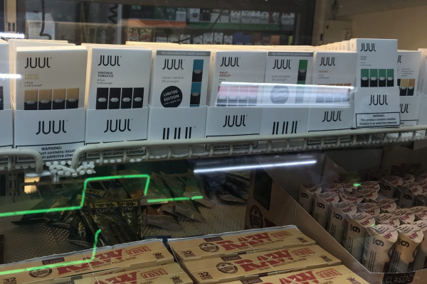 JUUL packages lined up at a store