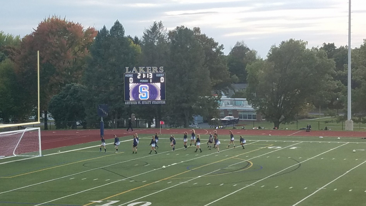 The Skaneateles girls soccer team warms up before their first game of the 2020 season.