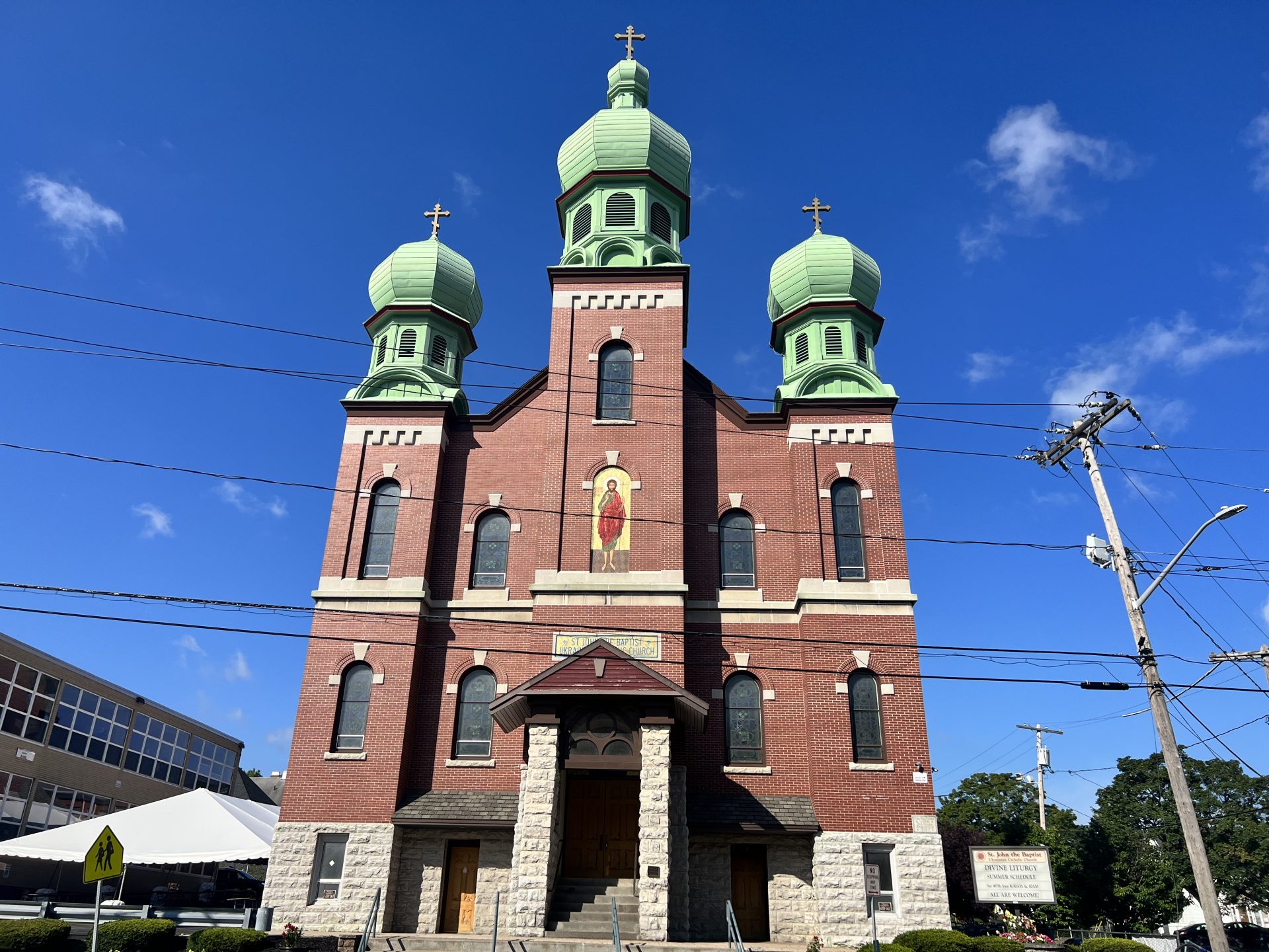The Saint John the Baptist Catholic Church sits steady in downtown Syracuse
