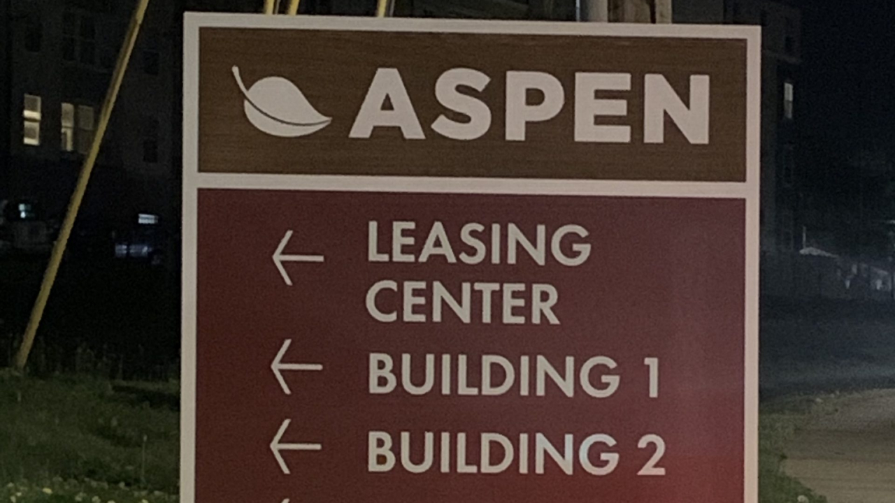 Aspen Apartments sign
