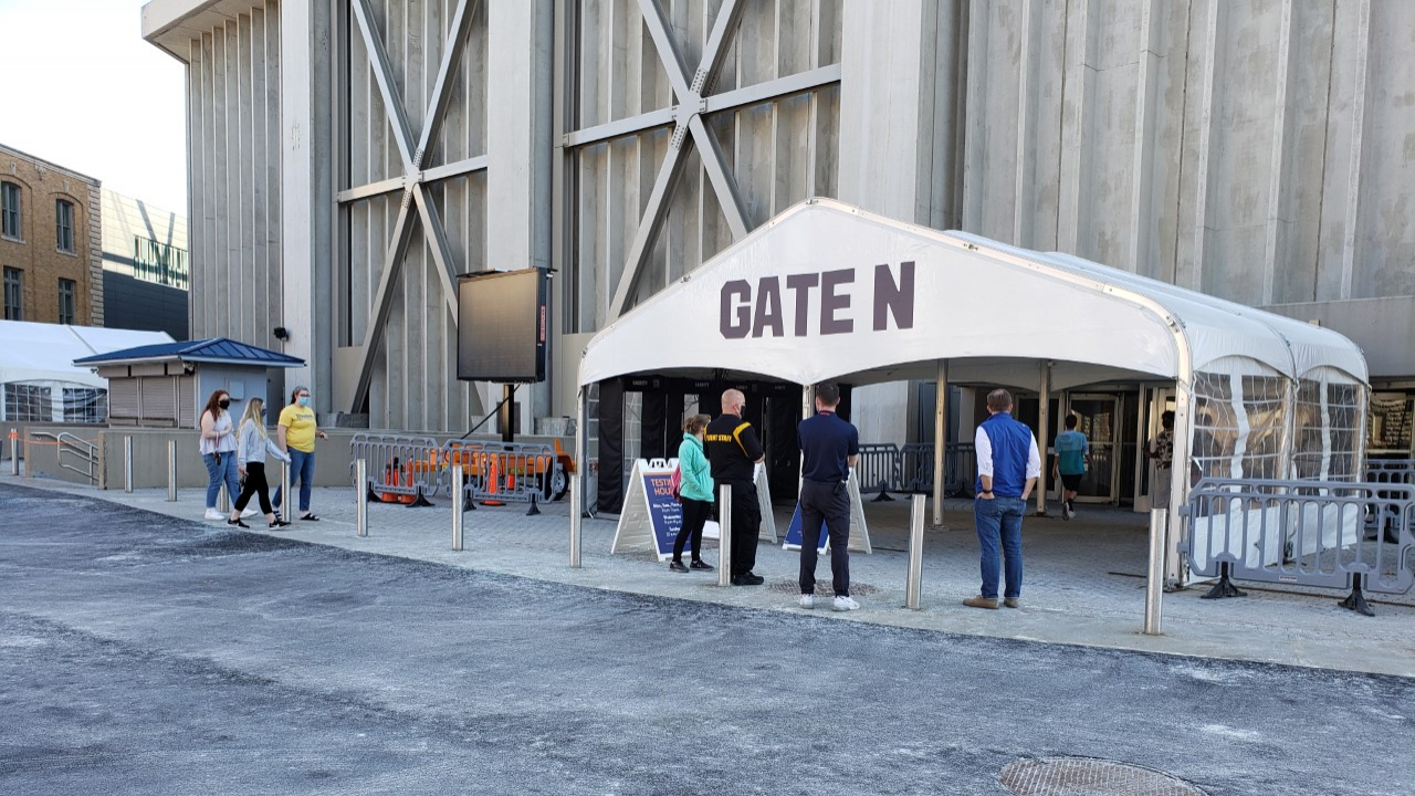 Syracuse University students enter the Carrier Dome COVID-19 testing site on Wednesday, April 7, 2021. Syracuse University began administering doses of the Johnson & Johnson vaccine the same day.