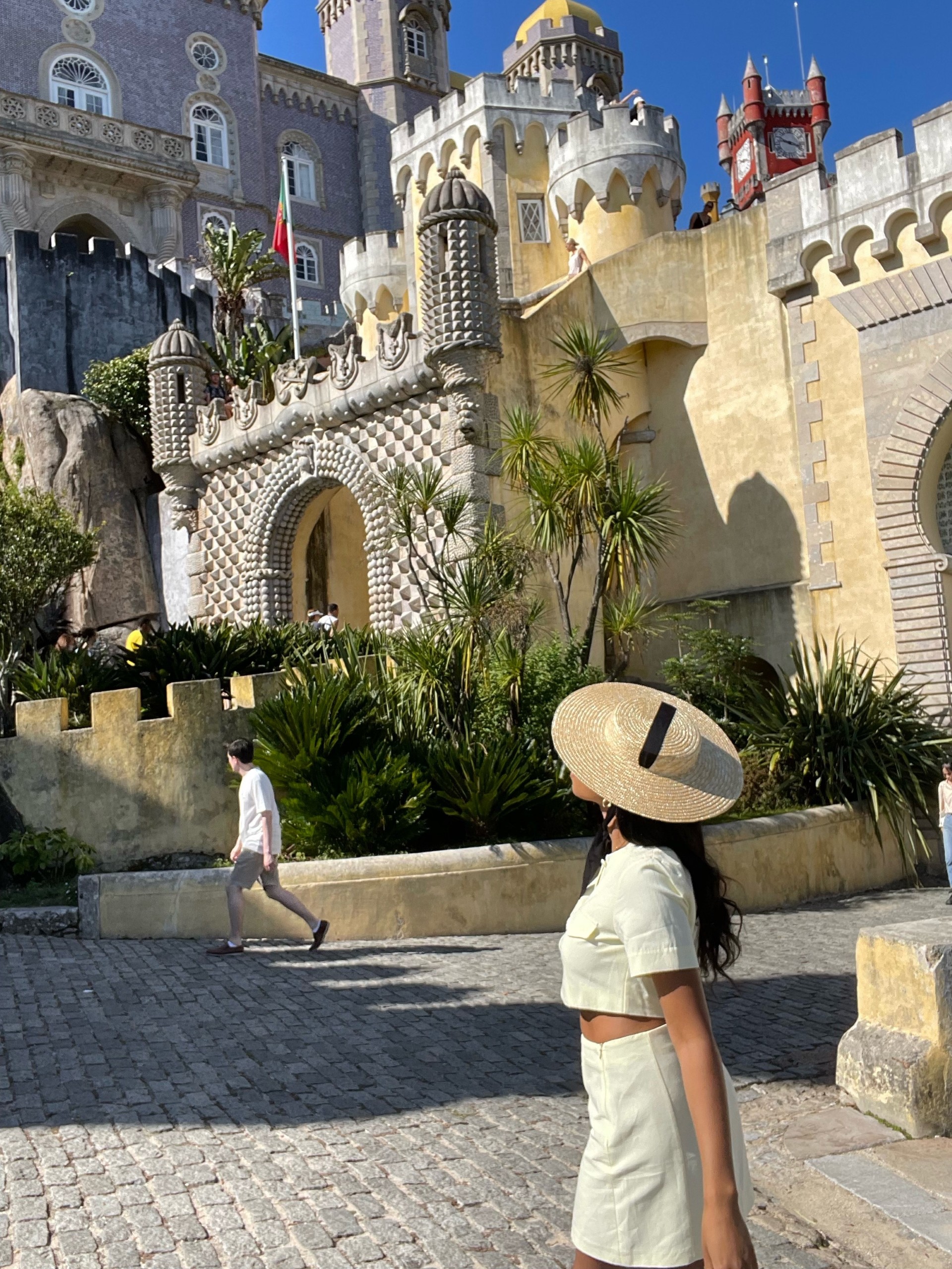 Krystin Lilly looks up at the golden castle at Pena Palace