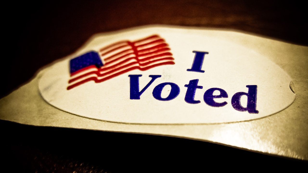 This is a photo of a sticker that reads "I Voted" that many voters can receive upon leaving the voting polls.
